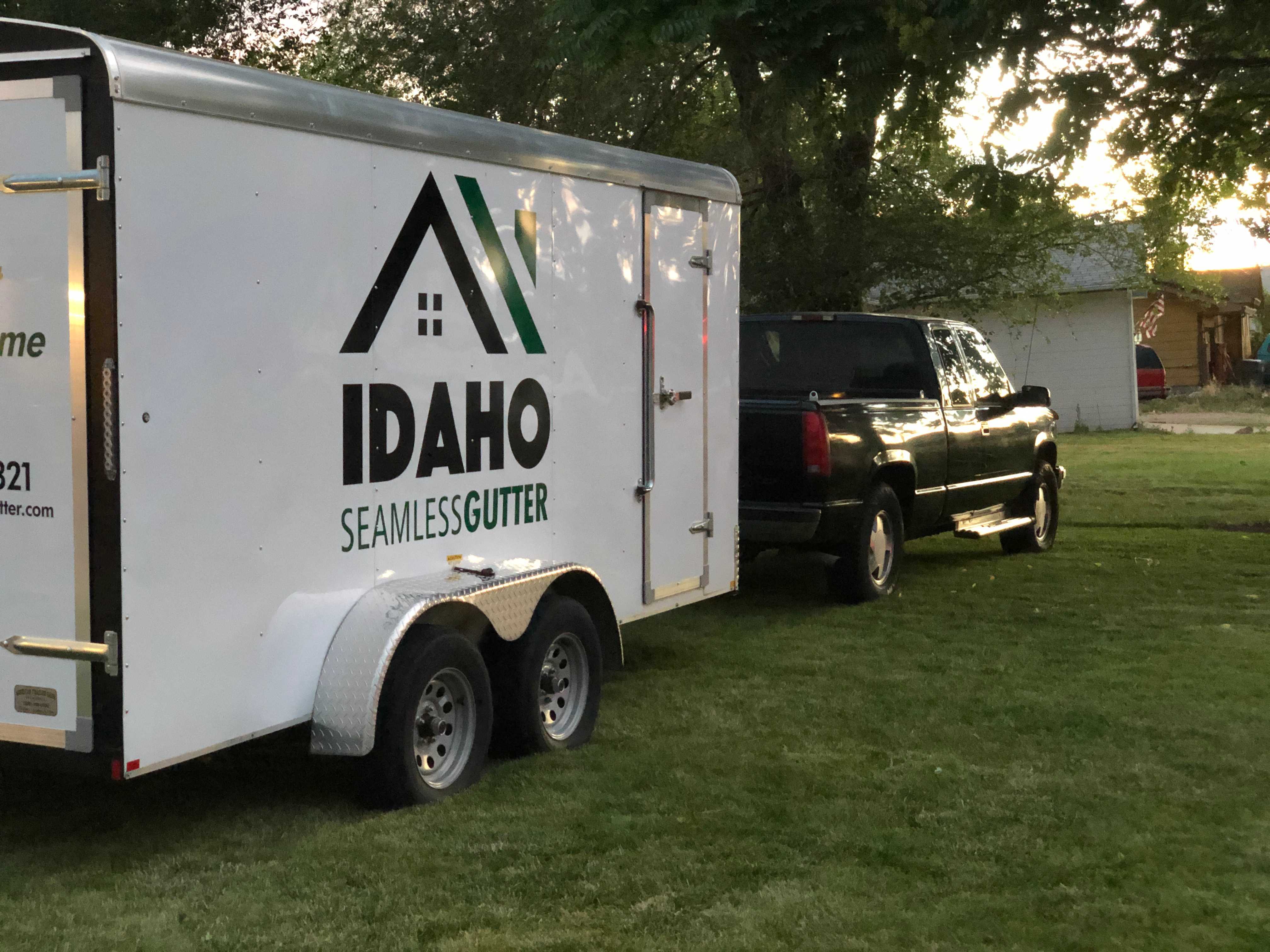 Truck with Idaho Seamless Gutter trailer.
